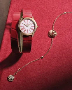 Bracelet, 18k yellow gold, carnelian, mother‑of‑pearl^OMEGA Fashion