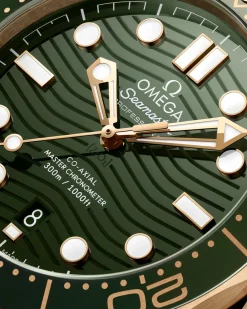 42 mm, Moonshine™ gold on rubber strap^OMEGA Outlet