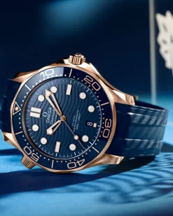 42 mm, Sedna™ gold on rubber strap^OMEGA New